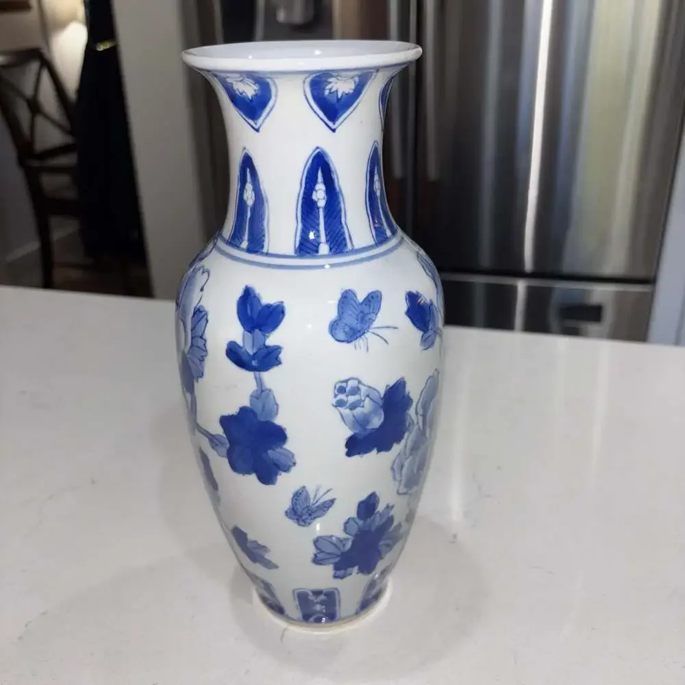 Vintage Blue and White Floral Porcelain Vase with Butterfly Motif